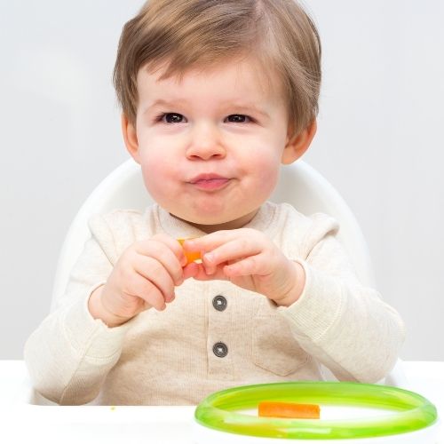 toddler eating snack