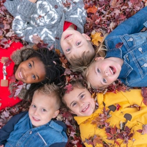kids in leaves
