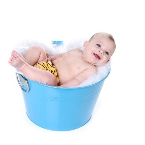 baby boy in blue tub