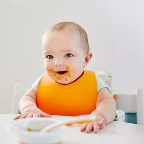 baby eating silicone bib