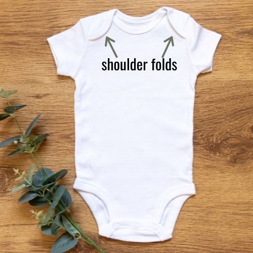 onesie with shoulder folds 