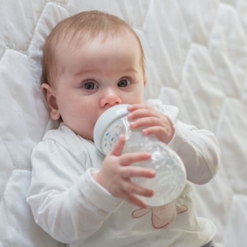 baby drinking avent natural bottle